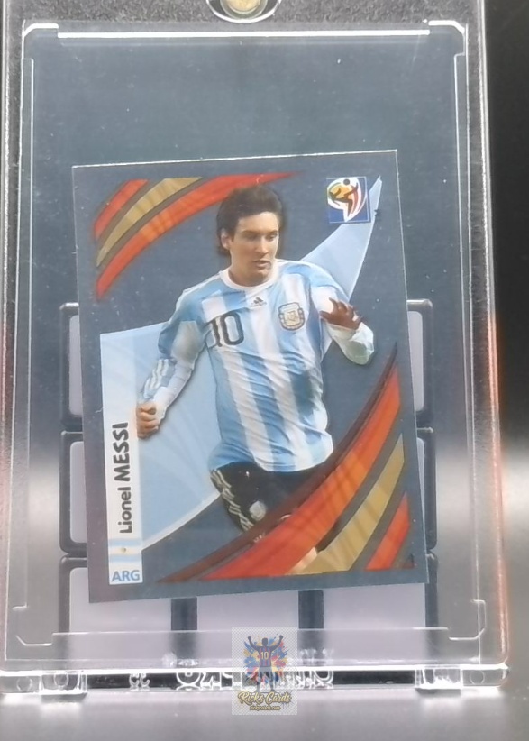   2010 Panini Lionel Messi card is from the FIFA World Cup South Africa Stickers set, card #122, featuring Base Sticker, Raw. Messi Cards 17